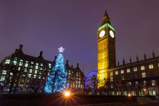 The traditional Christmas tree is now in place outside the Houses of Parliament in London